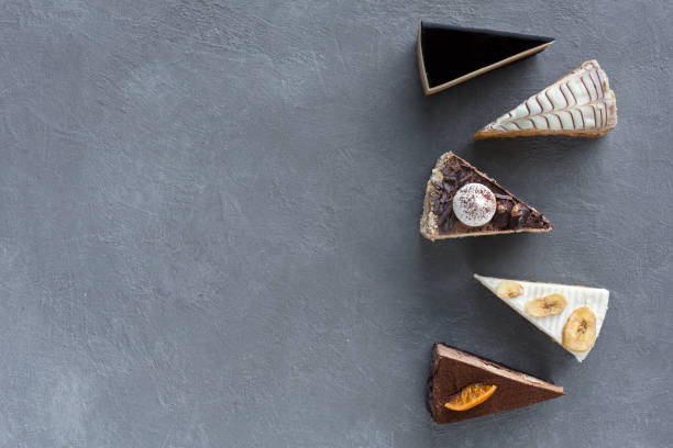 istock Assortment of pieces of cake, copy space 979217638
