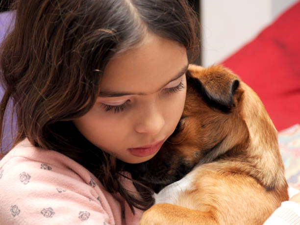 girl with her pet hug