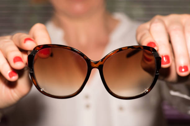 istock A woman and sunglasses 979236078
