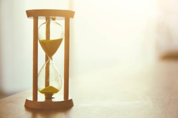 istock Hourglass as time passing concept for business deadline. 979237606