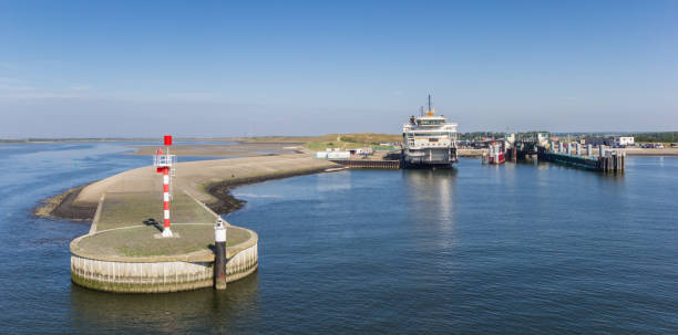 istock Ferry harbor at Texel island in The Netherlands 979253268