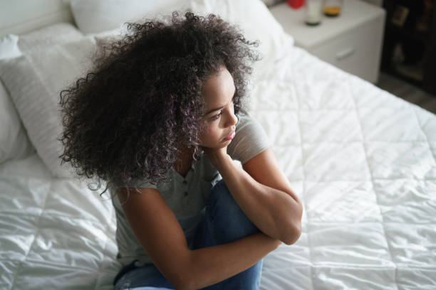 istock Depressed Hispanic Girl With Sad Emotions And Feelings 979255726