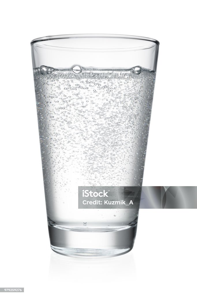 Glass of water isolated Glass of mineral sparkling water isolated on white background with clipping path Drinking Glass Stock Photo