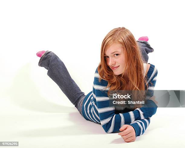 Beautiful Redhead Girl Lying Down Stock Photo - Download Image Now - 14-15 Years, 16-17 Years, Beautiful People