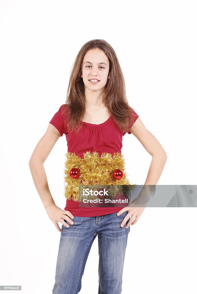 Christmas t-shirt Girl wearing a special Christmas t-shirt, white background 12-13 Years Stock Photo