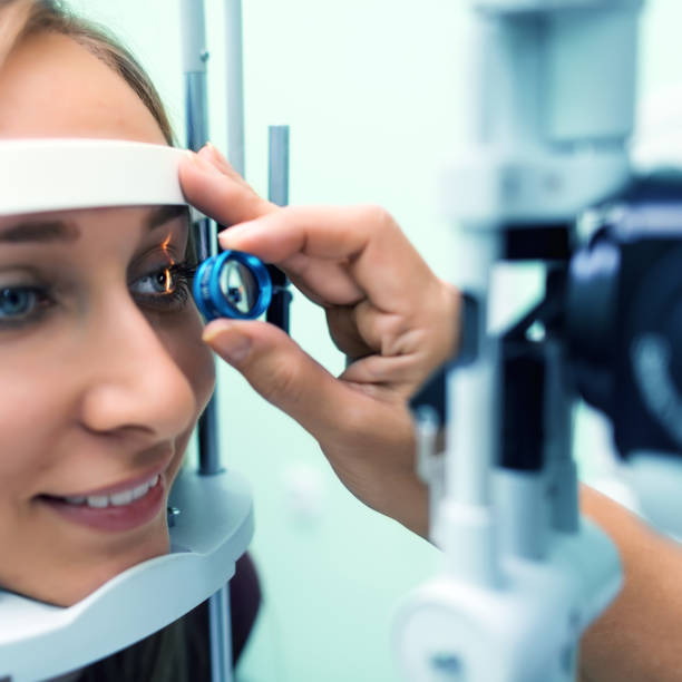 Eyesight exam Ophthalmology eyesight examination dilation stock pictures, royalty-free photos & images