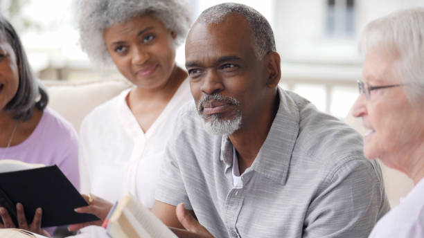 istock Senior man facilitates Bible study 979269402