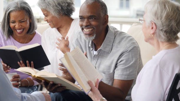 istock Senior man leads Bible study in retirement community 979269410