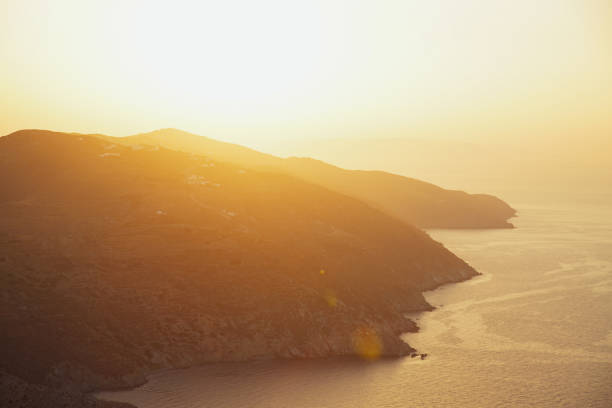 Sunset view from a hill above Chora on North East coast of Folegandros island, Greece.
