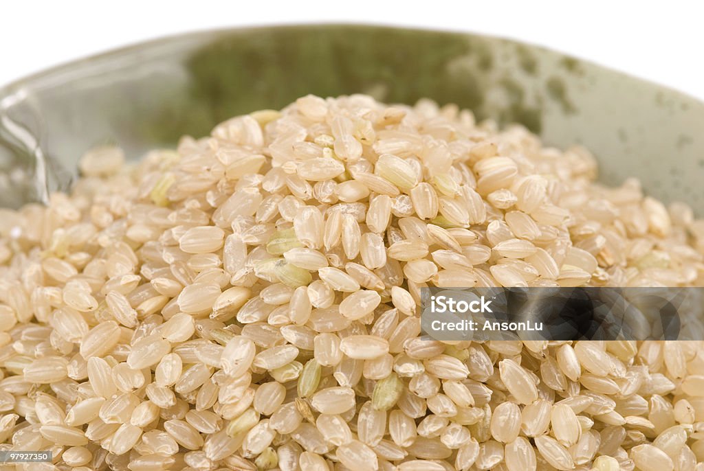 Isolated brown rice in bowl  Agriculture Stock Photo