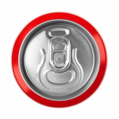 Aluminum drink or beverage can with white straw on red background. Drinking beverage. Top or overhead view.