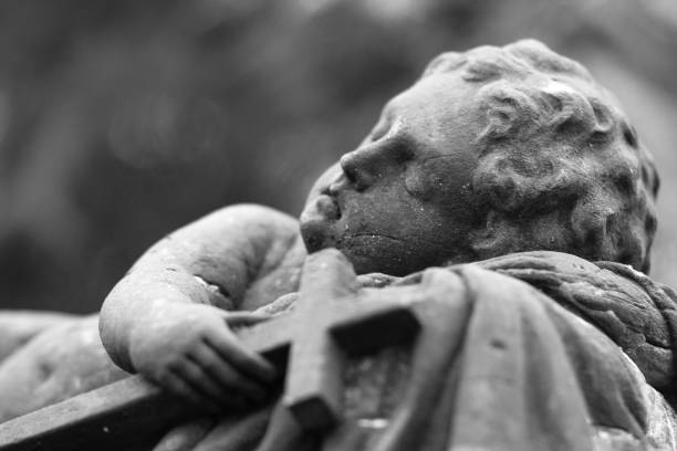 istock stone angel in the cemetery 979303372
