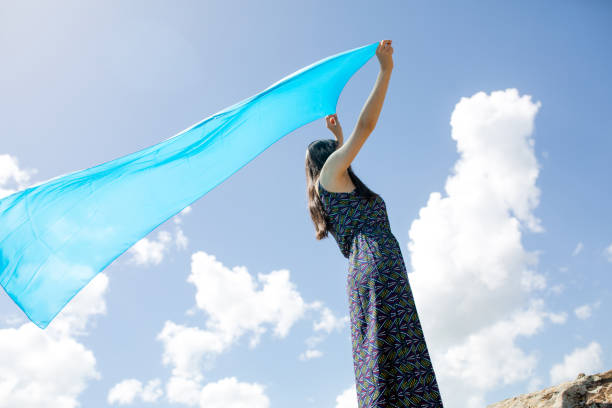 istock a young woman in the spring 979304826
