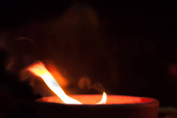 istock candle burning in the cemetery 979306218