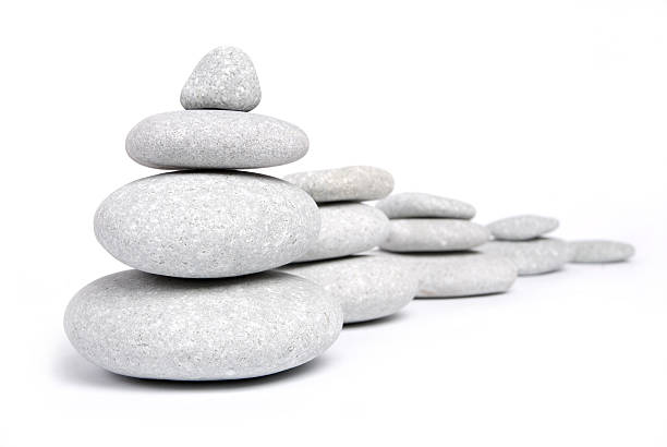 Balancing of pebbles stock photo