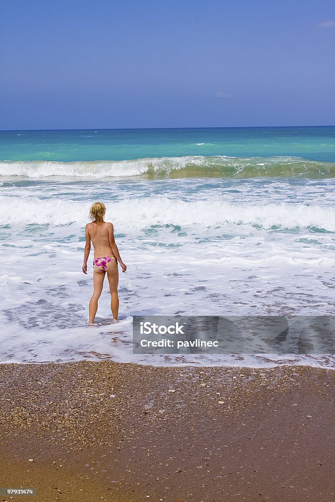 woman on the beach a beutiful woman on the beach in Mediterranean Adult Stock Photo