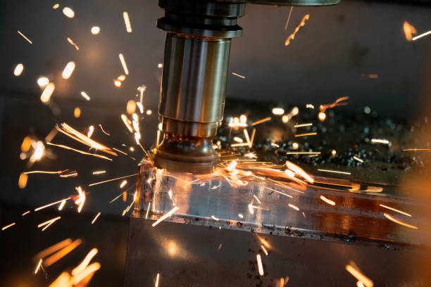 istock The CNC milling machine cutting the mold part in roughing  process 979315632