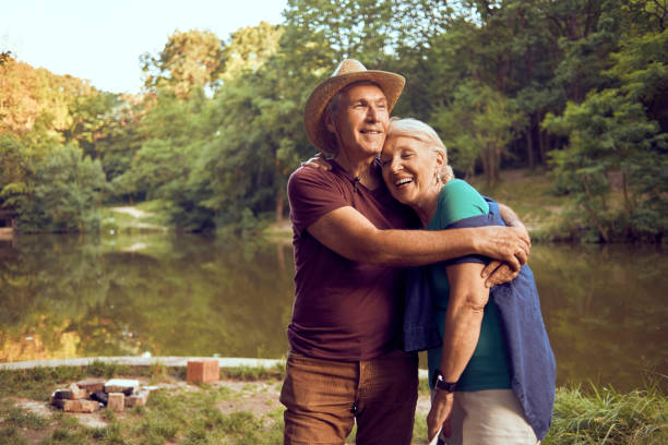istock romantic senior couple hugging 979321284