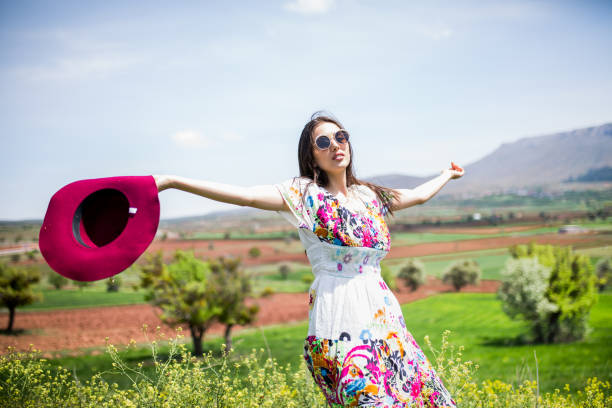 istock a young woman in the spring 979321808