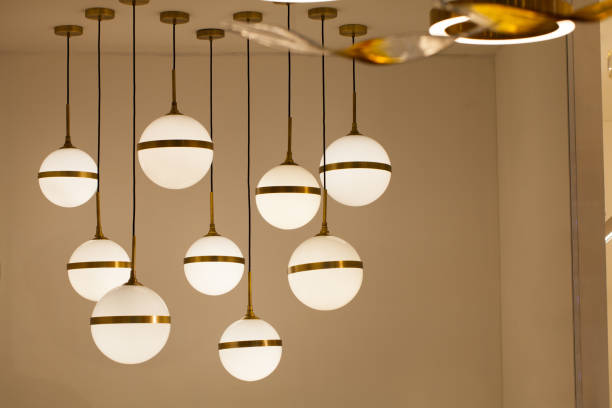 istock Beautiful chandelier. luxury expensive chandelier hanging under ceiling 979322268