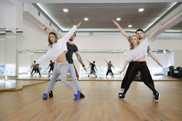 istock Group of four hip-hop dancers 979329812