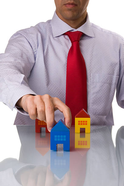 istock businessman selling a house 97935636