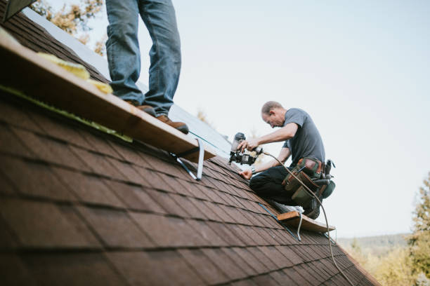 General Contractor Installing New Roof A roofer and crew work on putting in new roofing shingles.  Small local business serving local families in Washington State. roof repair stock pictures, royalty-free photos & images