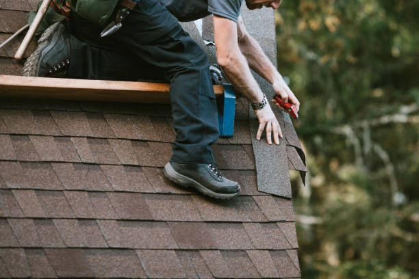 General Contractor Installing New Roof A roofer and crew work on putting in new roofing shingles.  Small local business serving local families in Washington State. rooftop stock pictures, royalty-free photos & images