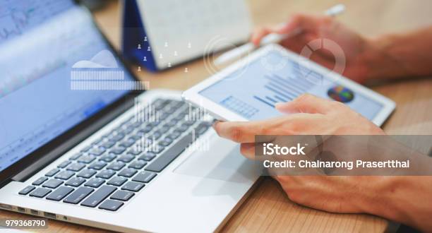 Close Up Business Man Hand Hold Tablet For Thinking About Stock Market Graph Trading With Statistic Chart Infographic Concept Stock Photo - Download Image Now