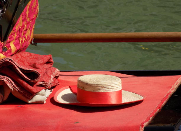 istock Gondolier straw hat hat on a gondola in Venice 979370906