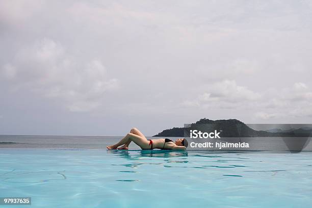 Enjoying The Paradise Stock Photo - Download Image Now - Adult, Adults Only, At The Edge Of