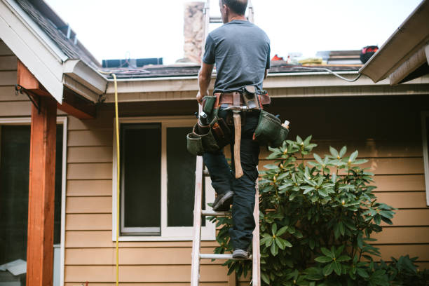 General Contractor Installing New Roof A roofer and crew work on putting in new roofing shingles. Small local business serving local families in Washington State. roofing contractors stock pictures, royalty-free photos & images