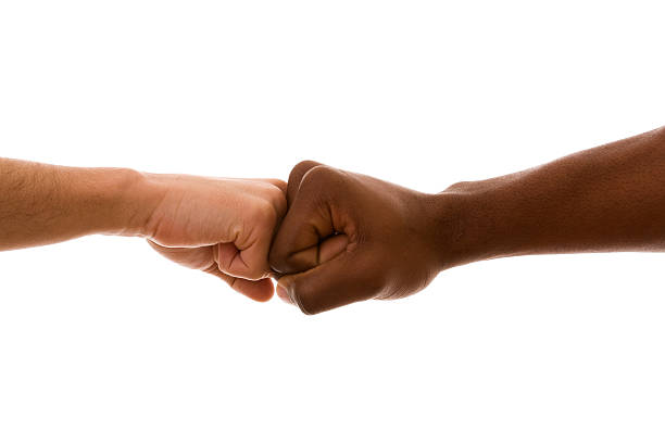 istock Fists of different races stick together defying racism 97941018