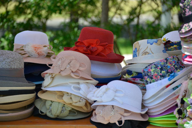 istock Cute colorful hats on the market stall 979419224