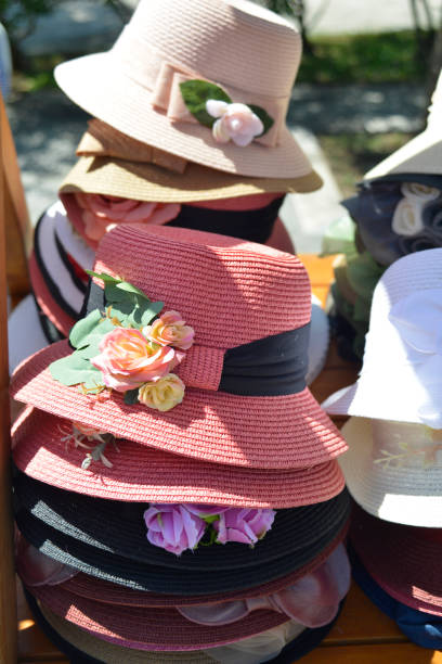istock Cute colorful hats on the market stall 979419242