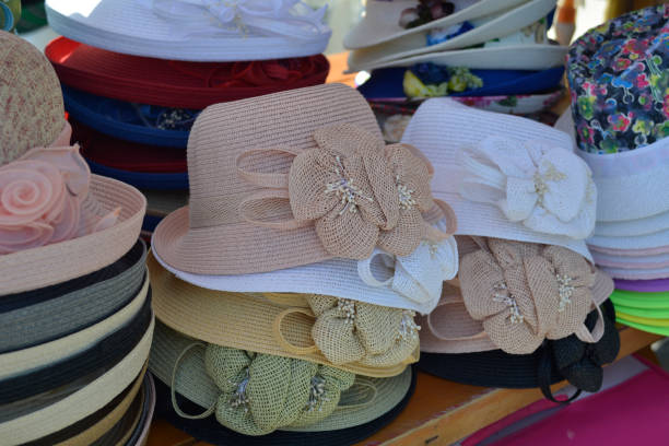 istock Cute colorful hats on the market stall 979419268