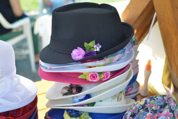istock Cute colorful hats on the market stall 979419280