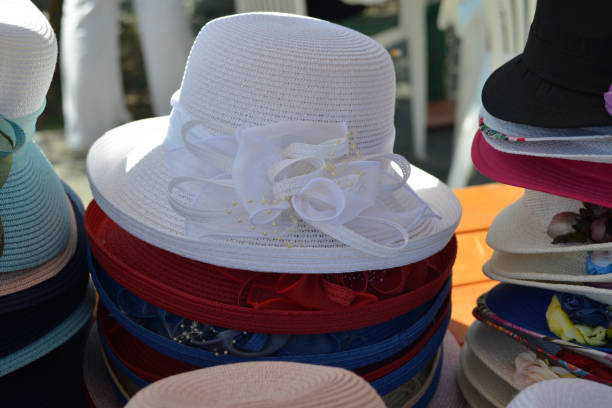 istock Cute colorful hats on the market stall 979419286
