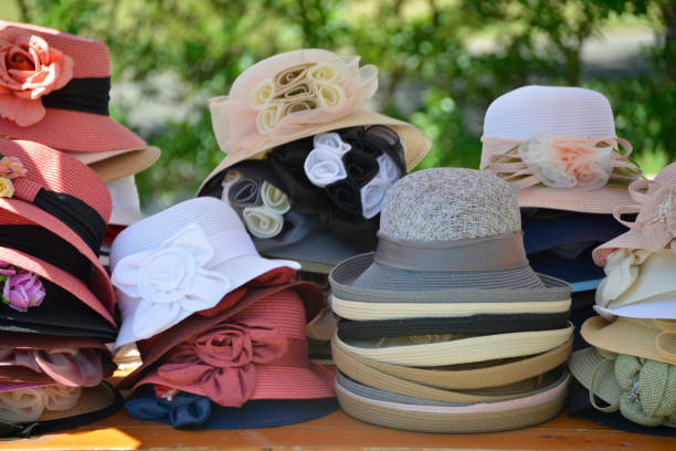 istock Cute colorful hats on the market stall 979419312