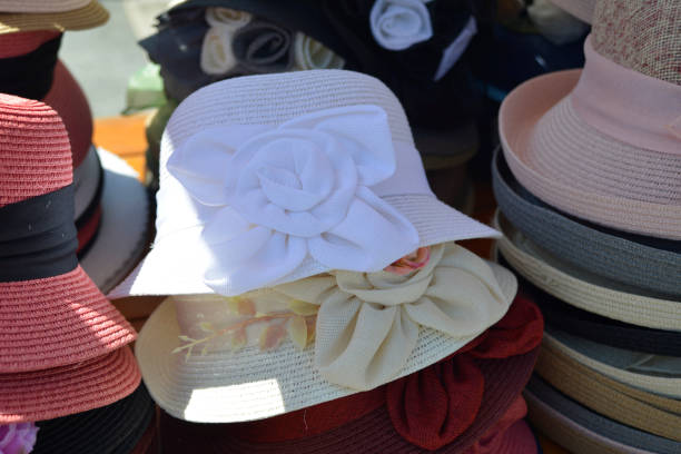 istock Cute colorful hats on the market stall 979419340