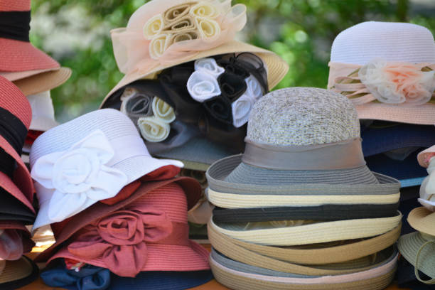 istock Cute colorful hats on the market stall 979419344