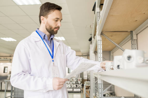 istock Examining Pressure Transducers at Factory Warehouse 979419910