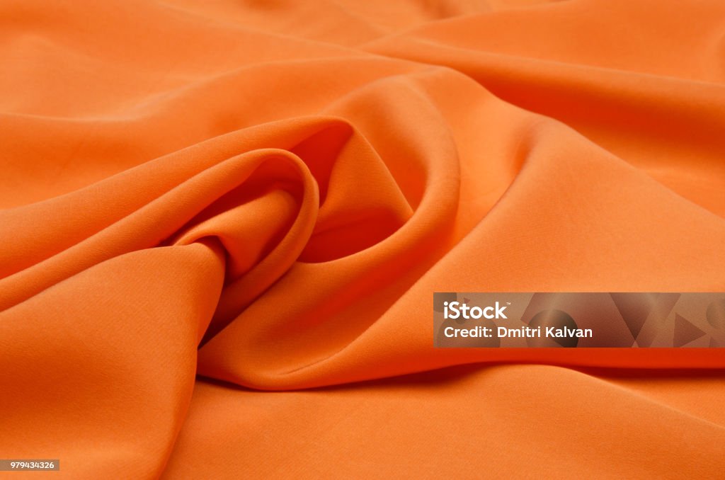 Silk fabrics of crepe de Chine orange Textile Stock Photo