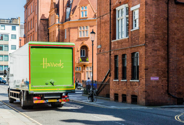 harrods van in knightsbridge London. May 2018. A view of a harrods van in knightsbridge harrods photos stock pictures, royalty-free photos & images