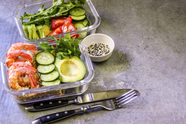 istock Healthy meal prep containers with quinoa and shrimp 979437716