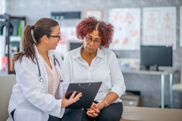 istock Doctor with an elderly patient 979441878