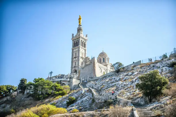 A low angle view of Notre-Dame de la Garde church at Marseille in a beautiful day of October 2017