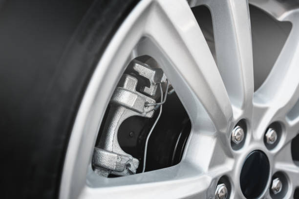istock car wheel. disc brakes. caliper and pads. 979457166