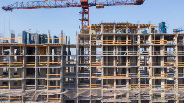 istock Aerial view on the building with construction cranes 979469246