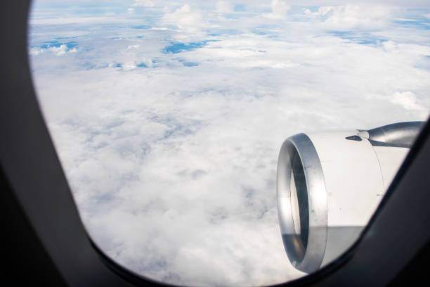 istock blue sky with the clouds from the plane view 979487132